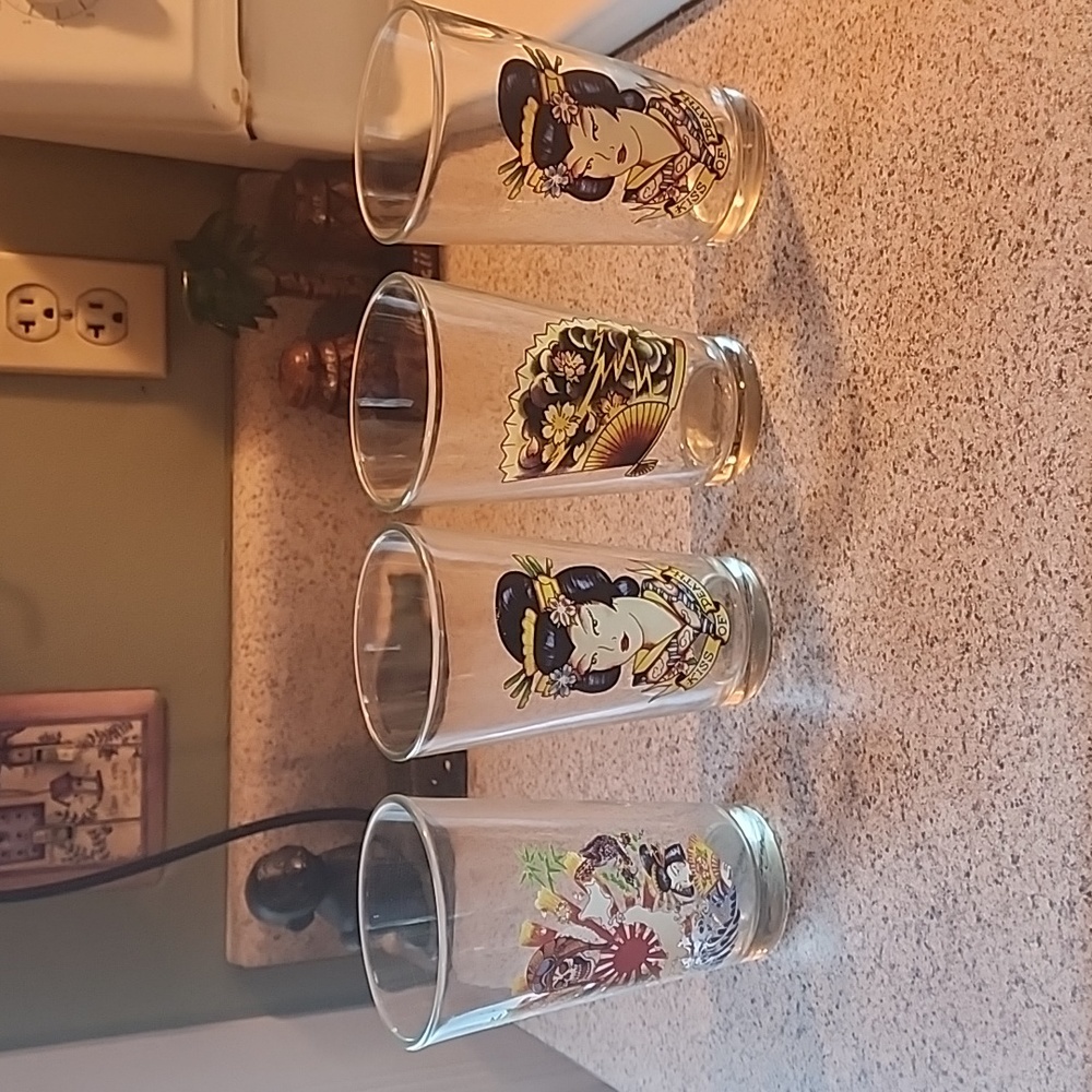 Set of 4 Ed Hardy pint glasses